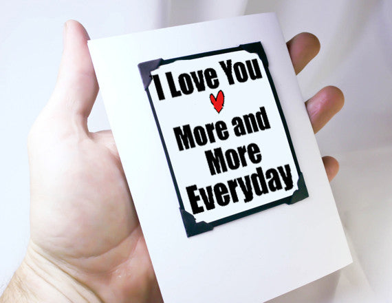 love you more and more anniversary card and gift