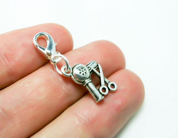 hairstylist charm with blow dryer and scissors